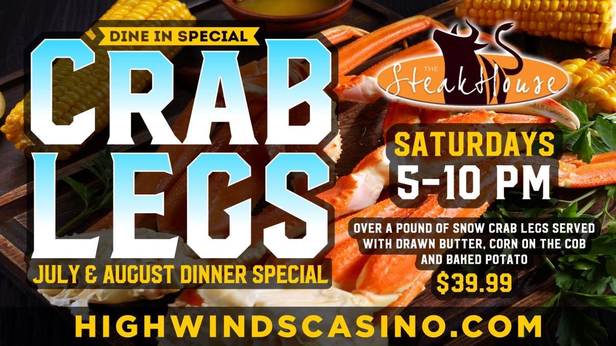 Promotional image for High Winds Casino's Steakhouse dinner special featuring crab legs. The background shows a close-up of snow crab legs, corn on the cob, greens, and a dish of drawn butter. Bold text reads: 